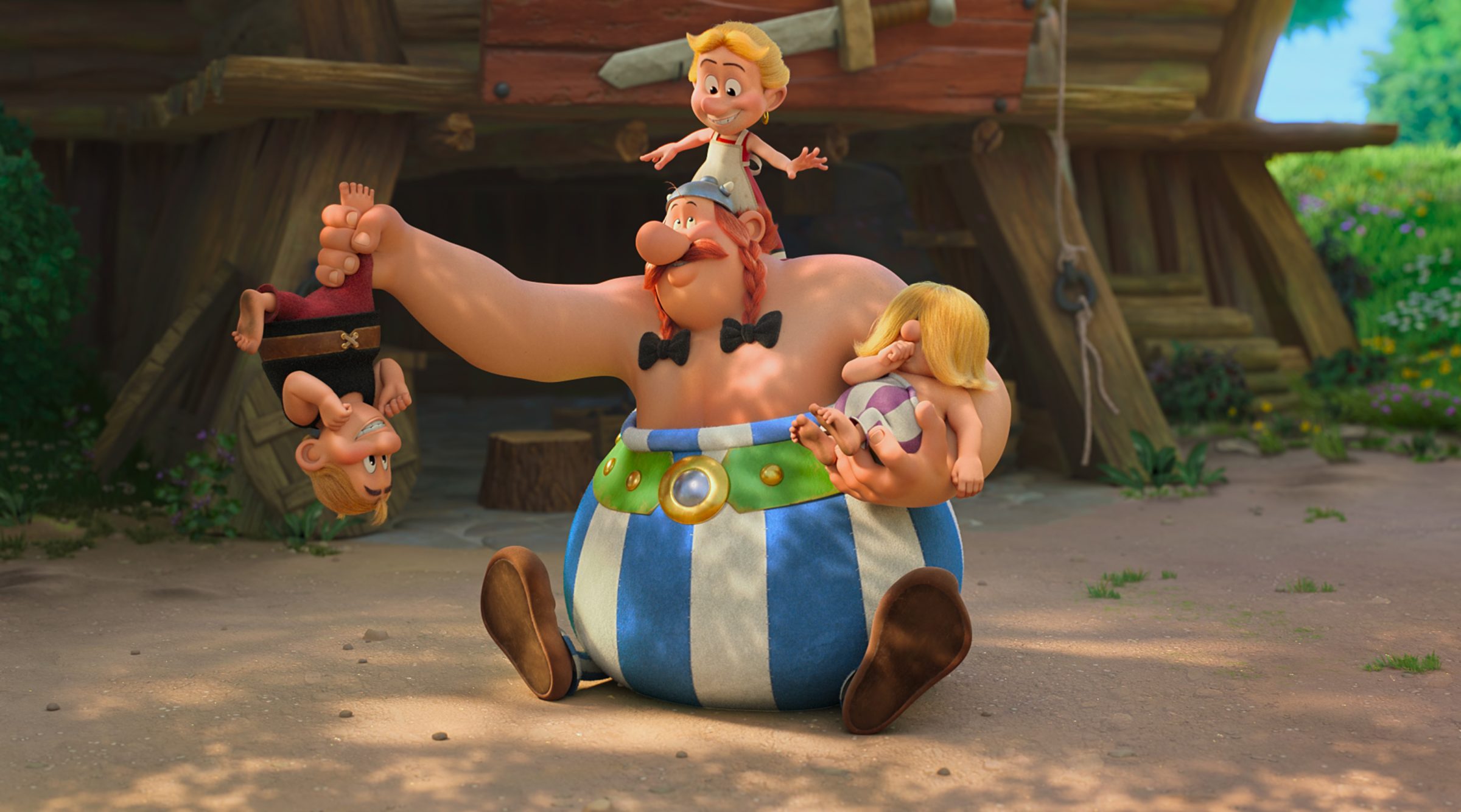 Obelix kümmert sich um die zu Kindern gewordenen Dorfbewohner.